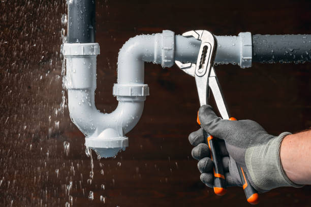 Professional Emergency Plumber technician working in Lake Cicott, IN